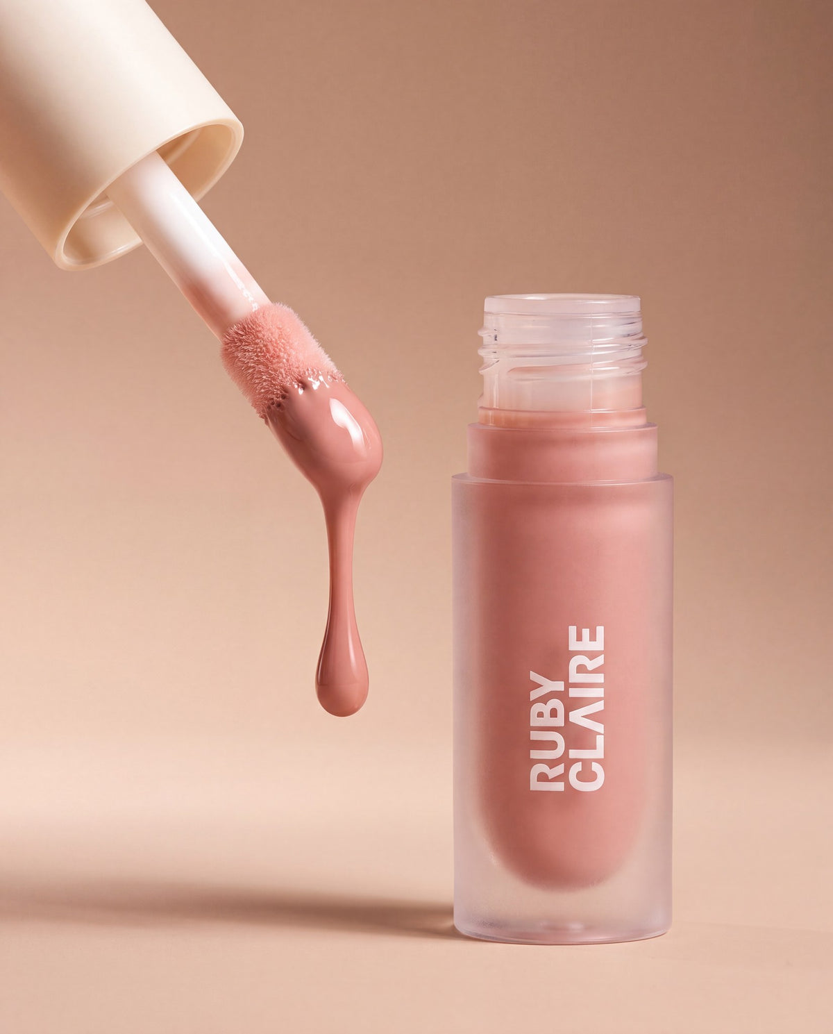 Ruby Claire Dream Lip Oil in Bare Sand — macro shot