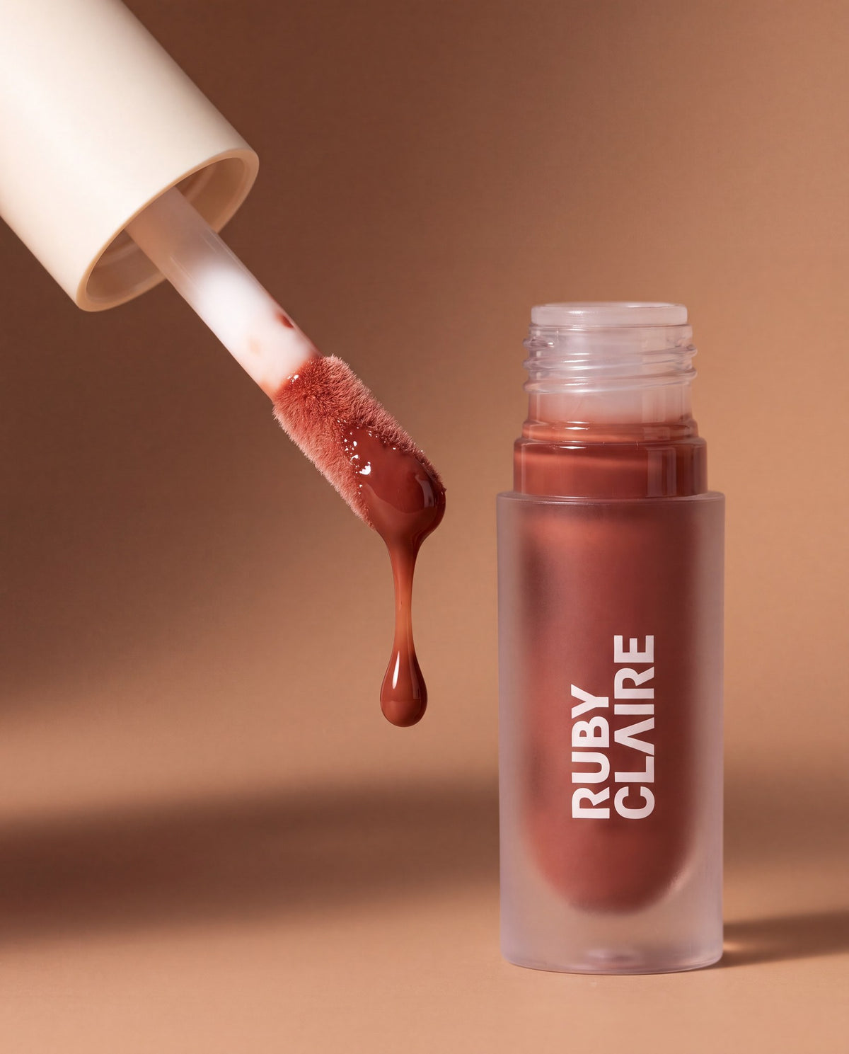 Ruby Claire Dream Lip Oil in Warm Beige — macro shot