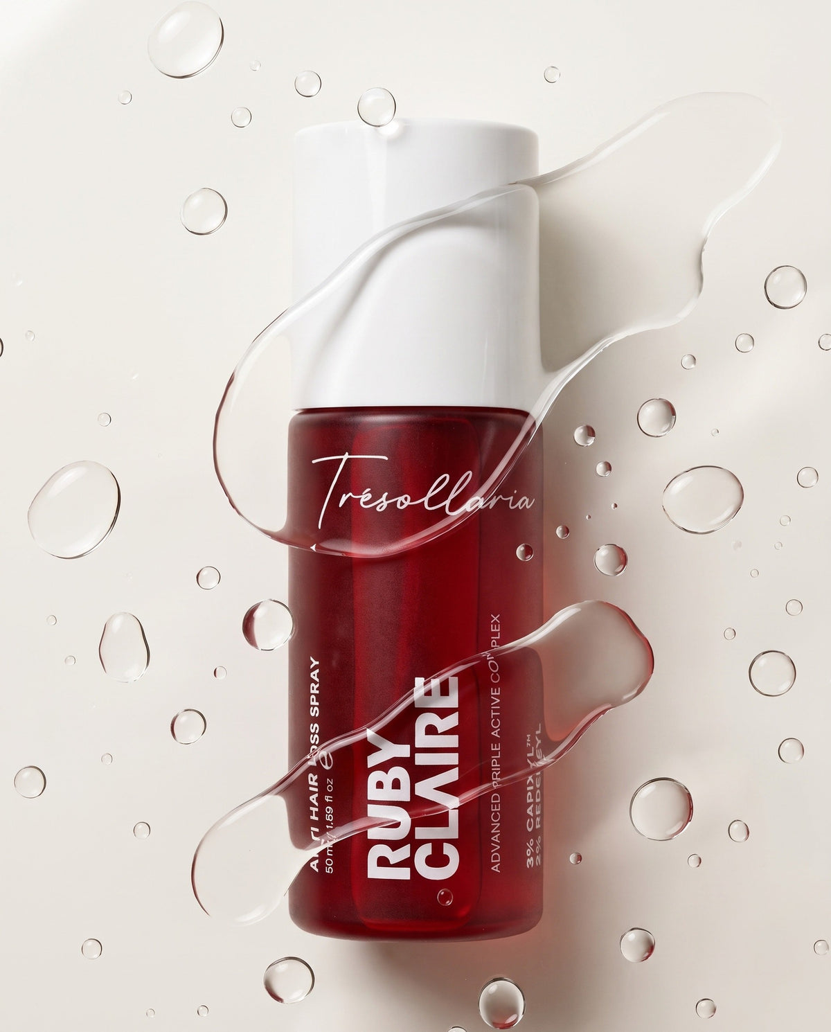 Anti Hair Loss Spray with water droplets and serum trails