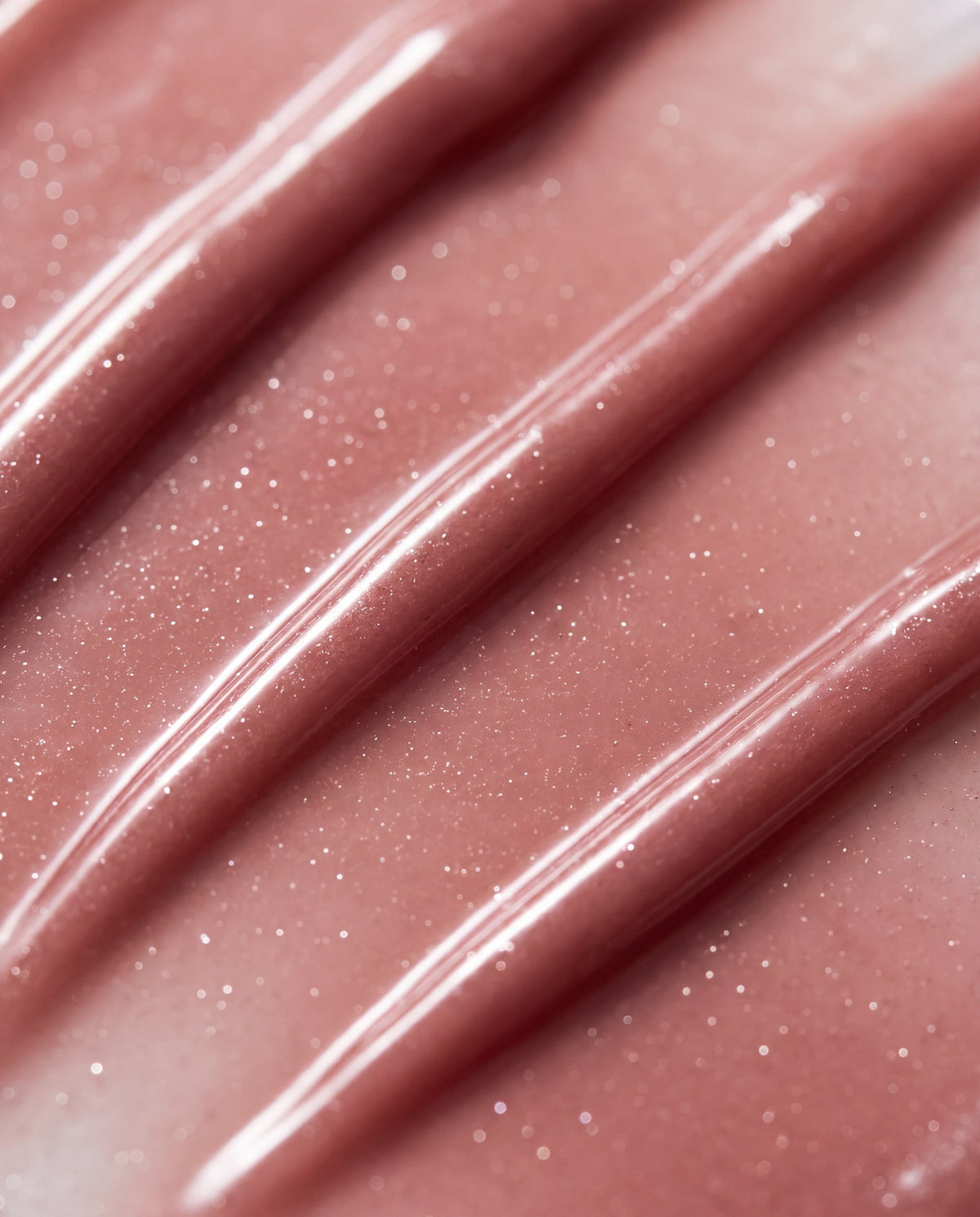 Ruby Claire Dream Lip Oil in Blush Dreams — macro texture