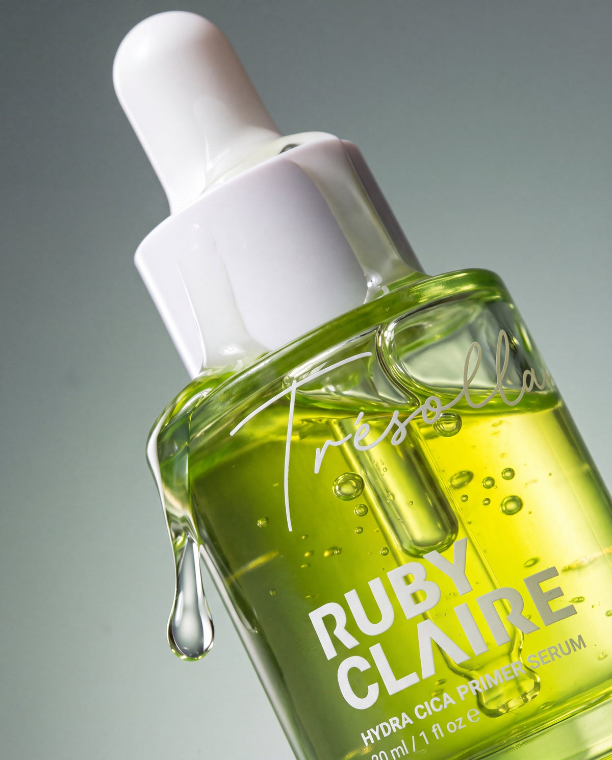 Ruby Claire Hydra Cica Primer Serum bottle with clear green serum pouring over the cap