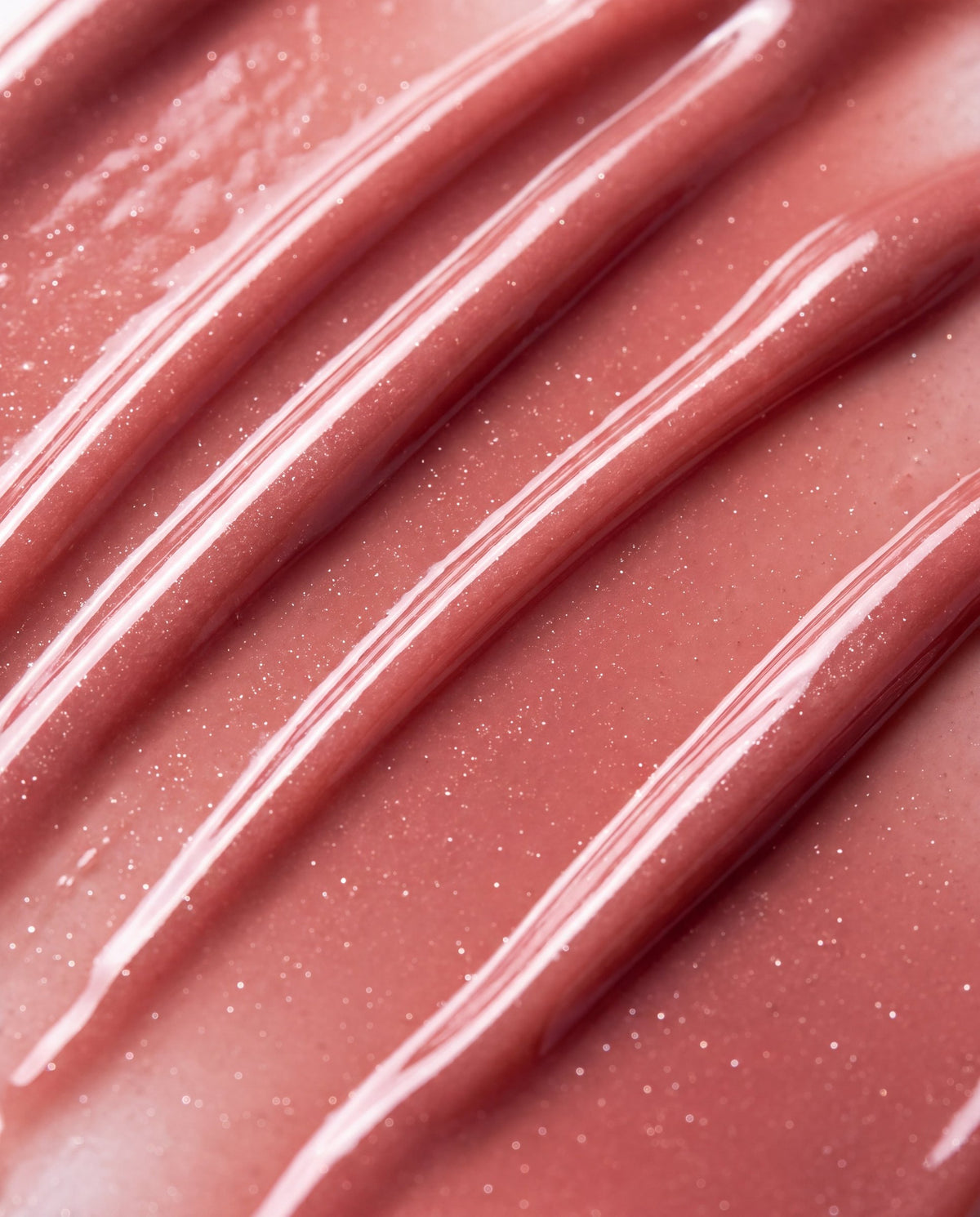 Ruby Claire Dream Lip Oil in Warm Beige — macro texture