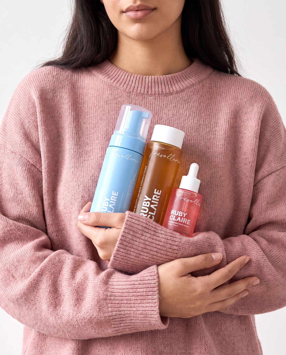 Woman holding the Ruby Claire Acne & Clarifying Set