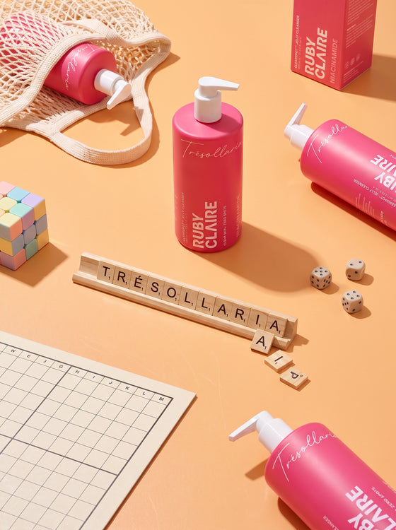 Ruby Claire ClearSpot Jelly Cleanser in a games-night flat lay